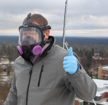 Gerald Page wearing a full face respirator