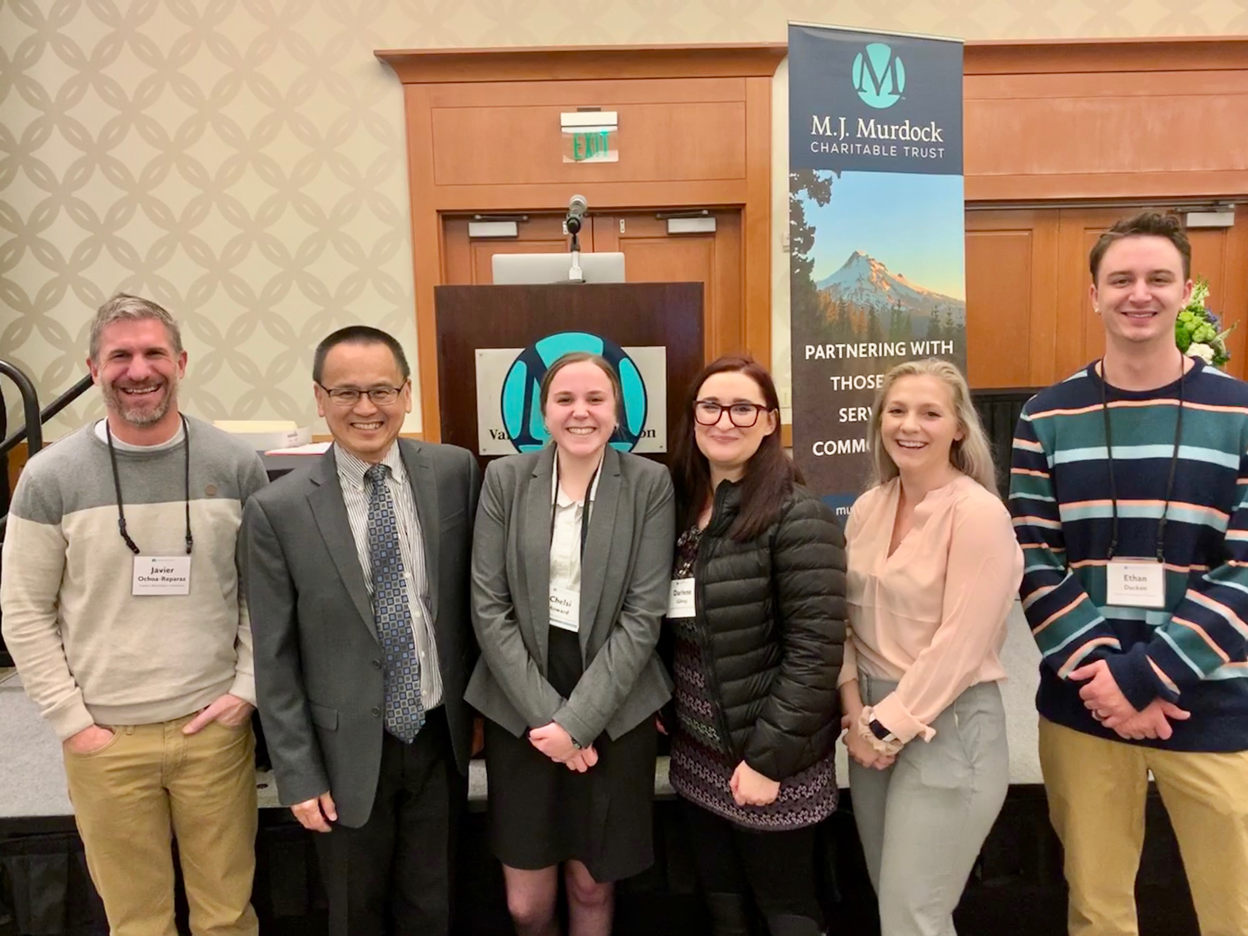 Darlene Gilroy with EWU faculty members and colleagues.