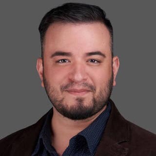 Andrew Pereira a McNair Scholar who earned a PhD