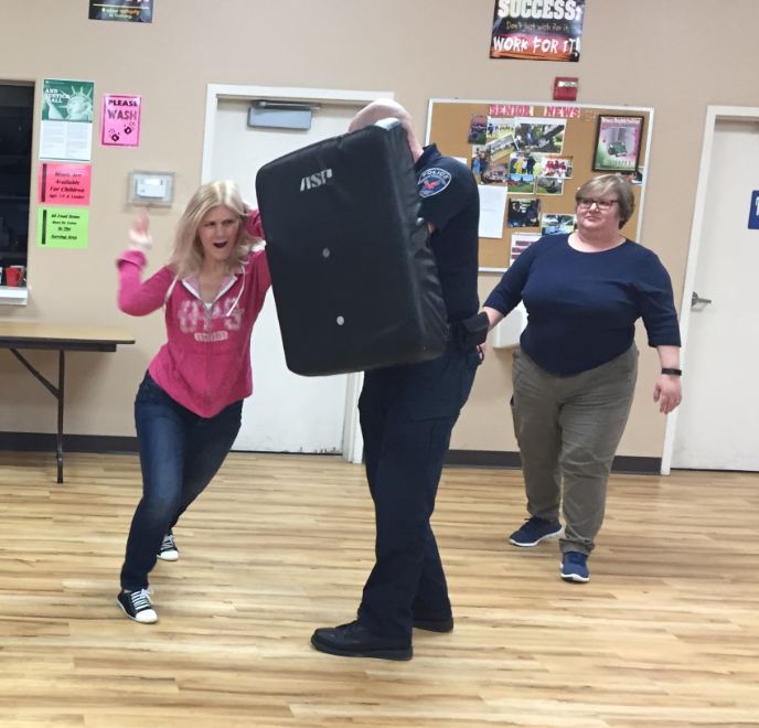 Officer Karlis instructing a self defense training.