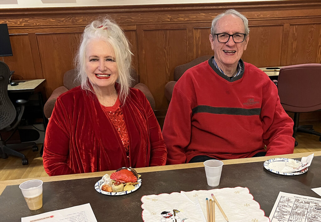 Retiree couple enjoying the party.