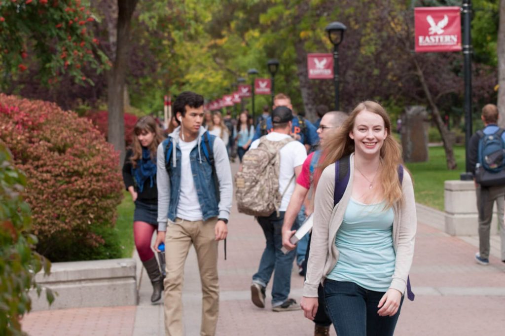Students walking on campus pathway